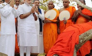 PM Modi offers prayer at Mahabodhi tree in Lanka's ancient capital