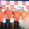 KXIP’s management flanks Ravi Pisharody of Tata Motors, a sponsor (third from left) and Virender Sehwag, the icon player (fourth from left)
