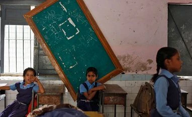 School reforms buried under paperwork School