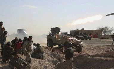 After US airstrikes, Iraq troops start final push for Tikrit