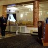 A file photo of Iranian President Hassan Rouhani, right, speaking at a news briefing, while his Foreign Minister Mohammad Javad Zarif, second left, deputy Foreign Minister Abbas Araghchi, first left, listen, at the Saadabad palace in Tehran, Iran