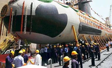 Scorpene leak: Retired Rear Admiral Menon asks Centre to minimise effects of information loss Workers and engineers from Mazagon Dock cheer during the floating of the first Project 75 (Scorpene) submarine on pontoon, in Mumbai, on Monday