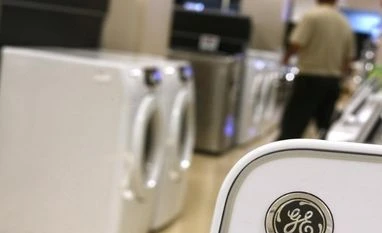 GE to sell real estate holdings, sets $50 bn share buyback