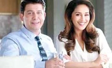 Aquaguard switches from direct selling to retail Sriram Nene and Madhuri Dixit