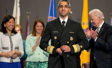 Trump sacks Obama-appointed Indian-American surgeon-general Vivek Murthy Alice Chen, left, Health and Human Services Secretary Sylvia Burwell, second from left, and Vice President Joe Biden, right, stand with U.S. Surgeon General Vivek Murthy, center, after he is ceremonially sworn-in in Conmy Hall at Fort Myer.