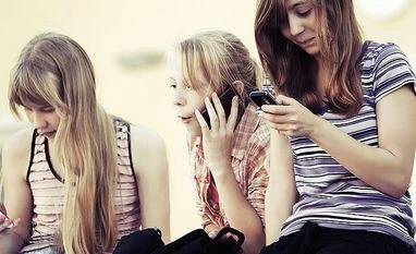 Want to do well in exams? Shun mobile phone in school