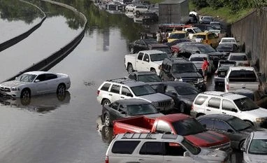 Houston submerged as wild weather kills 20 in US, Mexico
