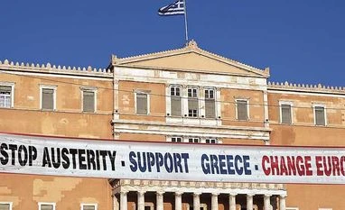 ECB boosts emergency funding as Greek banks bleed, Tsipras calm