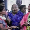 Relatives mourn the death of a victim of illicit alcohol during funeral at Cemetery at Malad in Mumbai