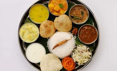 Falling tomato prices bring down cost of veg, non-veg thalis in Sept Falling tomato prices bring down cost of veg, non-veg thalis in Sept