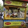 A vendor works at a roadside Maggi noodles eatery in Ahmedabad