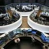 Europe, Asia shares rally, dollar dips on US rate outlook