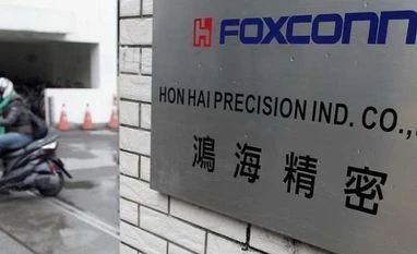 Adani says in talks with Foxconn for JV, no deal yet Adani, Foxconn