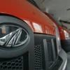 A worker cleans a Mahindra vehicle inside the company's showroom on the outskirts of Agartala, capital of Tripura