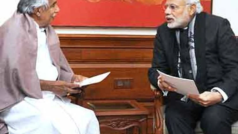 Oomen Chandy & Narendra Modi. File photo Oomen Chandy & Narendra Modi