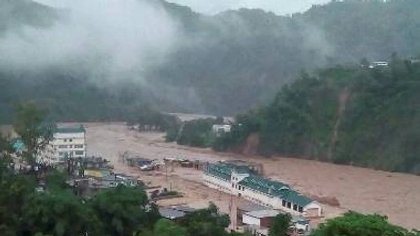 Flooded Dharampur market and bus station after a cloud burst in Mandi district of Himachal Pradesh