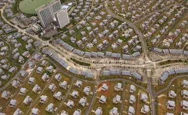 China says property market to continue recovering in H2