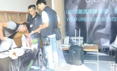 Uber drivers arrested in Hong Kong, police raid office