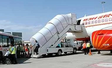 Air India plane suffers tyre burst; all 128 passengers safe Air India plane suffers tyre burst; all 128 passengers safe