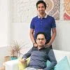 Livspace co-founder and CEO Anuj Srivastava (standing) and  co-founder and director Ramakant Sharma