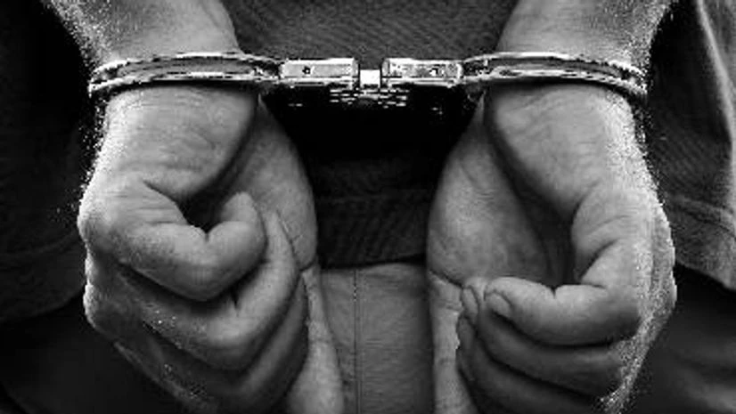 Image via Shutterstock Arrest