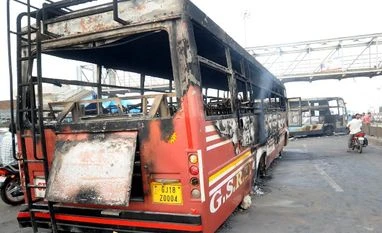 Gujarat returns to normalcy, army flag march continues