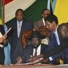 South Sudan President Salva Kiir Mayardit (seated)