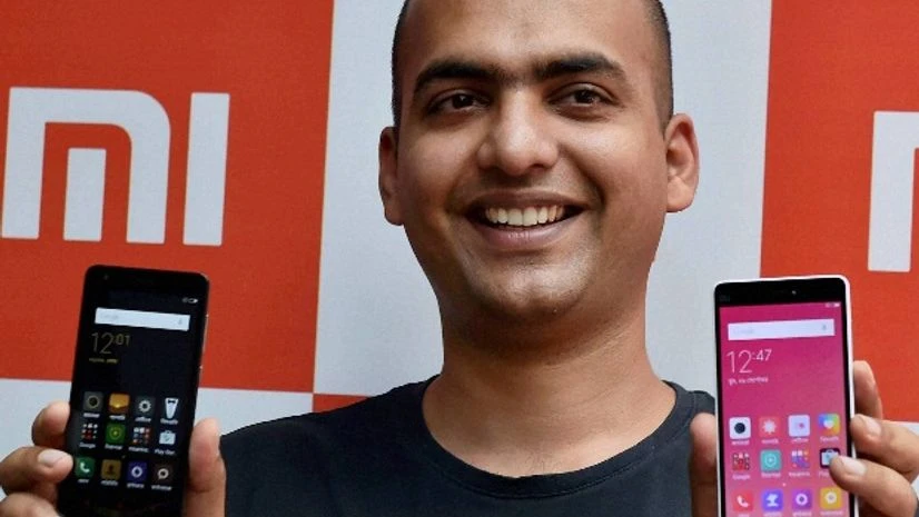 Xiaomi's India head Manu Jain displays the new phones during a launching event, in Kolkata Xiaomi's India head Manu Jain displays the new phones during a launching event, in Kolkata
