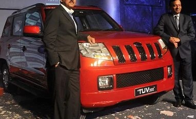 Mahindra counts on a tough new SUV to revive sales M&M chairman Anand Mahindra and executive director Pawan Goenka at the launch of TUV300 in Pune on September 10, 2015. Photo: Suryakant Niwate
