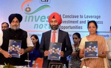 Gujarat tops ease of doing business ranking among states Commerce Minister Nirmala Sitharaman along Punjab Deputy Chief Minister Sukhbir Singh Badal and Rajasthan MLA Manvender M Singh releasing a book during the CII Invest North 2015 conclave, in New Delhi