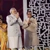 Prime Minister Narendra Modi with External Affairs Minister Sushma Swaraj and Madhya Pradesh Chief Minister Shivraj Singh Chouhan greet  during the inauguration of 10th World Hindi Conference at Lal Parade Ground,  in Bhopal