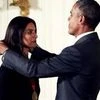 US President Barack Obama presents the National Humanities Medal to Jhumpa Lahiri.
