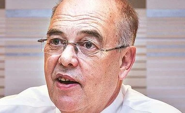 Do not anticipate default; there's no need to rejig debt: John Flintham John Flintham