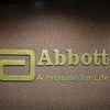 An Abbott company logo is pictured at the reception of its office in Mumbai