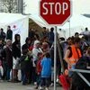 Austria launches daily cap on refugees despite EU anger
