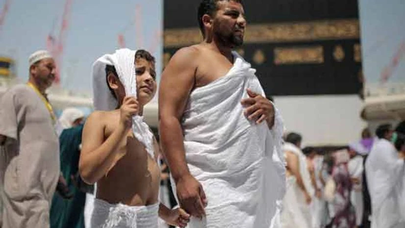 A father and a son circle the Kaaba at Grand Mosque in Mecca, Saudi Arabia, on Tuesday, Sept 22, 2015 Picture by PTI A father and a son circle the Kaaba at Grand Mosque in Mecca, Saudi Arabia, on Tuesday, Sept 22, 2015 Picture by PTI