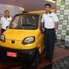 (from left) R c maheswari, president and Rajiv Bajaj, MD, Bajaj Auto with RE60