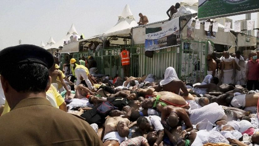 Muslim pilgrims and first responders gather around bodies of people crushed in Mina, Saudi Arabia during the annual Hajj pilgrimage Muslim pilgrims and first responders gather around bodies of people crushed in Mina, Saudi Arabia during the annual Hajj pilgrimage