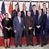 Prime Minister Narendra Modi (centre) with CEOs of top financial institutions before a meeting with them in New York on Thursday