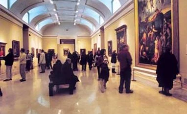 The collector as curator Can you spot the collector in the room?