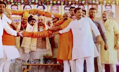 In Bihar, Shah battles quota and discontent BJP National President, Amit Shah being garlanded during Karyakarta Sammelan at Harsh Garden at Singhol in Begusarai, Bihar