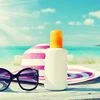 Sun lotion image via Shutterstock.