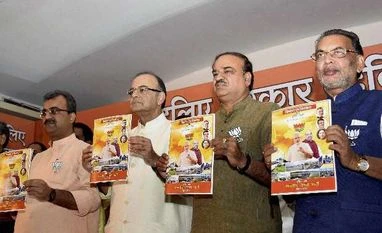 BJP promises free laptops, two-wheelers in poll manifesto Arun Jaitley, Bihar, Vision document, Elections