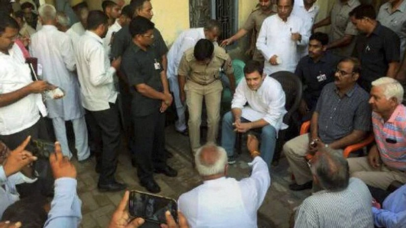 Congress Vice President Rahul Gandhi interacts with villagers at Bisara village where Mohd Ikhlaq was recently lynched by a mob, in Dadri Congress Vice President Rahul Gandhi interacts with villagers at Bisara village where Mohd Ikhlaq was recently lynched by a mob, in Dadri