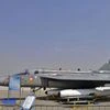 An Indian Air Force (IAF) light combat aircraft "Tejas" taxies on the tarmac during the "Aero India 2015" air show at Yelahanka air base in Bengaluru