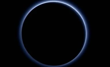 NASA spacecraft finds blue skies, water ice on Pluto Pluto's Blue Sky: Pluto's haze layer shows its blue color in this picture taken by the New Horizons Ralph/Multispectral Visible Imaging Camera (MVIC). Photo: NASA