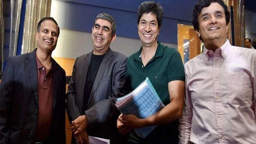 CEO of Infosys Technologies Vishal Sikka, outgoing CFO Rajiv Bansal, newly appointed CFO M D Ranganath (R) and COO Pravin Rao (L) at a press conference to announce the company's second quarter results in Bengaluru on Monday. CEO of Infosys Technologies Vishal Sikka, outgoing CFO Rajiv Bansal, newly appointed CFO M D Ranganath (R) and COO Pravin Rao (L) at a press conference to announce the company's second quarter results in Bengaluru on Monday.