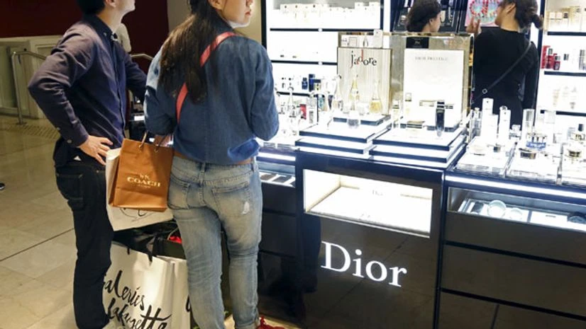 Customers visit the Galeries Lafayette department store in Paris, France Customers visit the Galeries Lafayette department store in Paris, France