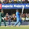 India's MS Dhoni hits a six during the 2nd ODI match against South Africa at Holkar Cricket Stadium in Indore