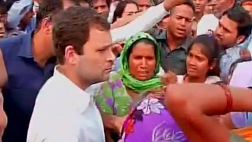 Rahul Gandhi meets with villagers blocking the highway where bodies of children burnt in Ballabgarh have been placed (Photo: ANI) Rahul Gandhi meets with villagers blocking the highway where bodies of children burnt in Ballabgarh have been placed